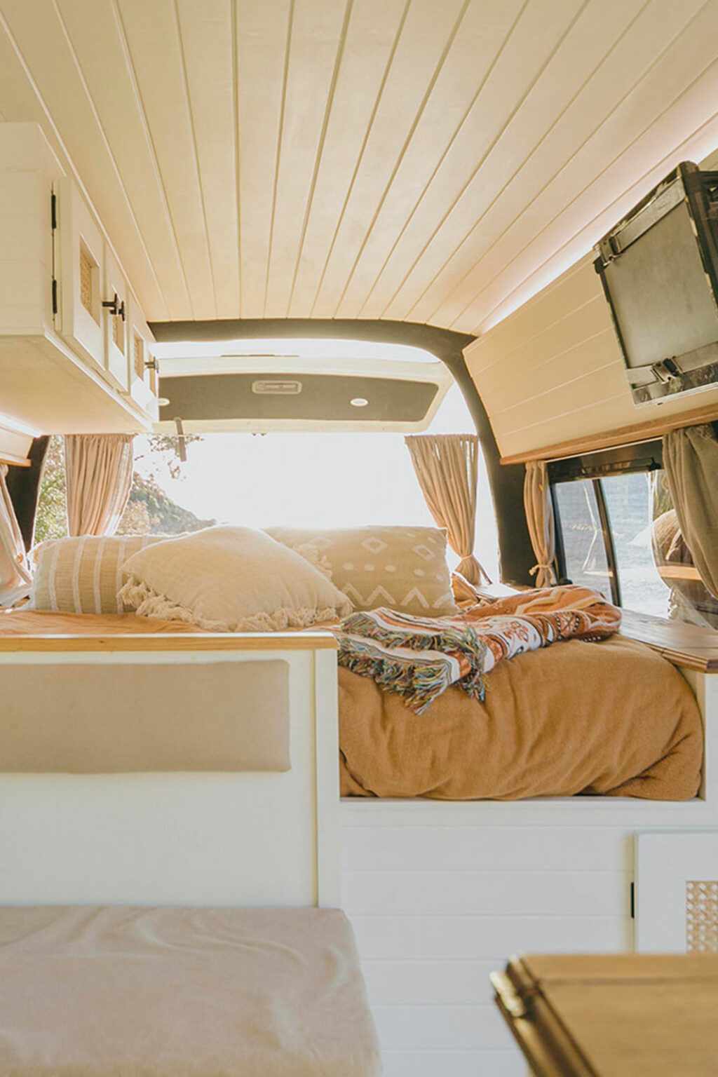 Campervan interior with bed